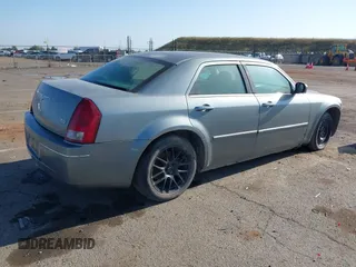 2006 Chrysler 300 Touring with VIN 2C3LA53G66H170047, listed as a IAAI auction lot 42135663 with 215,285 mi miles. Bid and sale history available at carsss.com. Image 4.