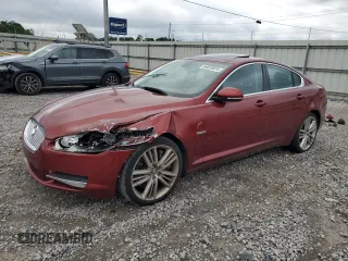 2010 Jaguar XF Supercharged with VIN SAJWA0HE1AMR74203, listed as a Copart auction lot 64029824 with 128,676 mi miles and Salvage Title. Bid and sale history available at carsss.com. Image 1.