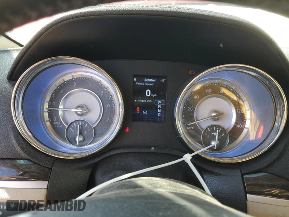2014 Chrysler 300 z VIN 2C3CCARG0EH249562, wystawiony jako Copart lot #60331535 z przebiegiem 153 730 mil mil oraz Szkoda całkowita • Salvage title. Historia ofert i sprzedaży dostępna na DreamBid. Obrazek 9.