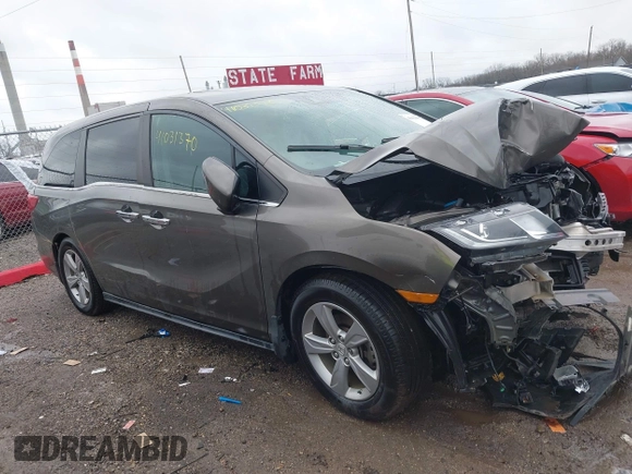 2018 Honda Odyssey EX-L with VIN 5FNRL6H72JB081086, listed as a IAAI auction lot 41031370 with 73,907 mi miles and . Bid and sale history available at DreamBid. Image 1.