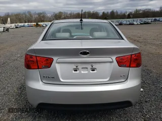 2010 Kia Forte EX z VIN KNAFU4A28A5109118, wystawiony jako Copart lot #56460755 z przebiegiem 143 845 mil mil oraz Szkoda całkowita • Salvage title. Historia ofert i sprzedaży dostępna na DreamBid. Obrazek 6.