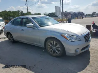 2013 Infiniti M with VIN JN1BY1AP5DM512633, listed as a Copart auction lot 63625755 with 102,190 mi miles and Salvage title. Bid and sale history available at DreamBid. Image 4.