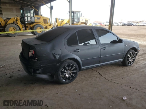 1999 Volkswagen Jetta GL z VIN 3VWRA29M7XM058584, wystawiony jako Copart lot #83714754 z przebiegiem 398 647 mil mil oraz Szkoda całkowita • Salvage title. Historia ofert i sprzedaży dostępna na DreamBid. Obrazek 3.