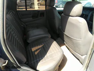 1994 Jeep Grand Cherokee Laredo with VIN 1J4GZ58Y3RC202638, listed as a IAAI auction lot 41885484 with 164,481 mi miles. Bid and sale history available at carsss.com. Image 8.