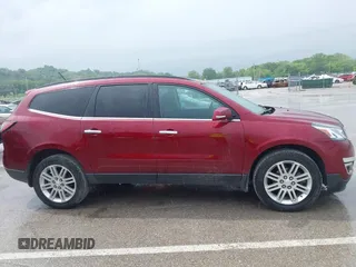 2015 Chevrolet Traverse LT z VIN 1GNKRGKD1FJ292257, wystawiony jako IAAI lot #42217359 z przebiegiem 93 892 mil mil oraz . Historia ofert i sprzedaży dostępna na DreamBid. Obrazek 14.