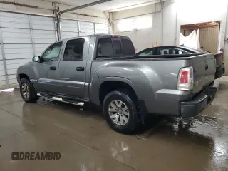 2008 Mitsubishi Raider LS z VIN 1Z7HC28KX8S572256, wystawiony jako Copart lot #76278594 z przebiegiem 139 373 mil mil oraz Szkoda całkowita • Salvage title. Historia ofert i sprzedaży dostępna na DreamBid. Obrazek 2.