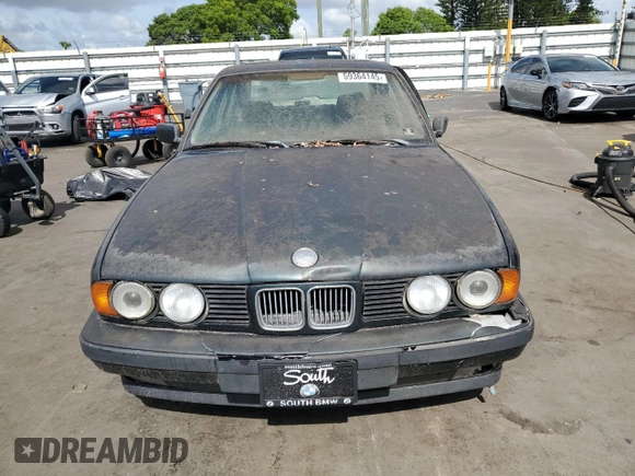 1994 BMW 5 Series 525i z VIN WBAHD632XRGK40231, wystawiony jako Copart lot #59364145 z przebiegiem Nie podano mil oraz Czysty tytuł • Clean title. Historia ofert i sprzedaży dostępna na DreamBid. Obrazek 5.