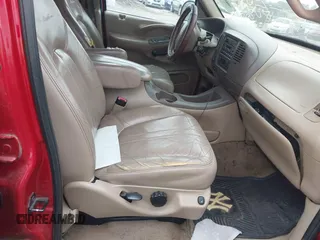 1999 Ford Expedition XLT z VIN 1FMPU18L7XLC51478, wystawiony jako IAAI lot #41679788 z przebiegiem Nie podano mil oraz . Historia ofert i sprzedaży dostępna na DreamBid. Obrazek 5.