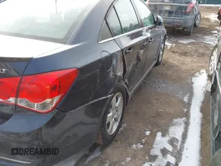2014 Chevrolet Cruze 1LT with VIN 1G1PC5SB5E7229007, listed as a IAAI auction lot 41544780 with 98,075 mi miles and . Bid and sale history available at DreamBid. Image 6.