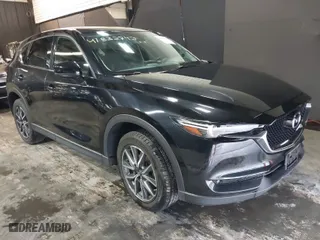 2017 Mazda CX-5 Grand Touring with VIN JM3KFBDL6H0207969, listed as a IAAI auction lot 41832742 with 77,271 mi miles. Bid and sale history available at carsss.com. Image 1.