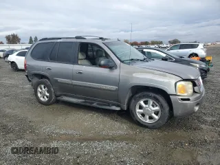 2005 GMC Envoy SLT with VIN 1GKDS13S852320018, listed as a Copart auction lot 80496544 with 237,451 mi miles and Salvage Title. Bid and sale history available at carsss.com. Image 4.