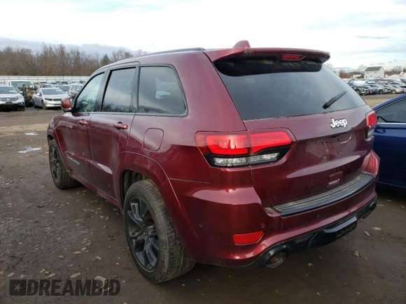 2017 Jeep Grand Cherokee SRT with VIN 1C4RJFDJ3HC919625, listed as a Copart auction lot 56986453 with 52,711 mi miles and Salvage Title. Bid and sale history available at carsss.com. Image 2.