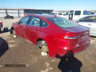 2019 Ford Fusion Hybrid SE with VIN 3FA6P0LU5KR189838, listed as a IAAI auction lot 41407401 with 134,834 mi miles. Bid and sale history available at carsss.com. Image 3.