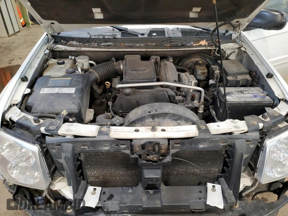 2004 GMC Envoy SLT with VIN 1GKDT13S042257444, listed as a Copart auction lot 89137605 with 301,920 mi miles and Salvage Title. Bid and sale history available at carsss.com. Image 12.