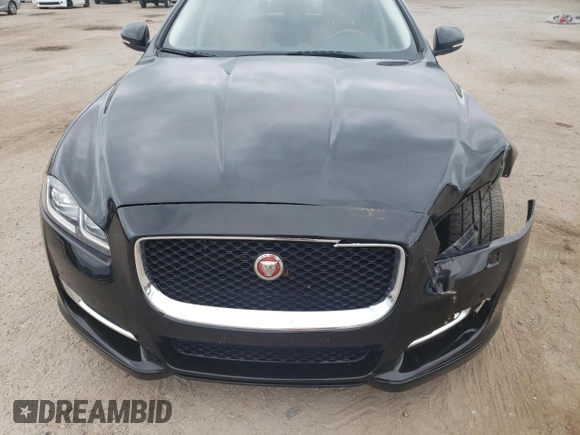 2017 Jaguar XJ with VIN SAJWA1C73H8W10544, listed as a Copart auction lot 70025724 with 64,437 mi miles and Salvage Title. Bid and sale history available at carsss.com. Image 12.