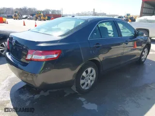 2010 Toyota Camry with VIN 4T1BF3EK7AU077859, listed as a IAAI auction lot 41776401 with 129,781 mi miles. Bid and sale history available at carsss.com. Image 4.