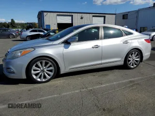 2012 Hyundai Azera z VIN KMHFH4JGXCA123949, wystawiony jako Copart lot #57114935 z przebiegiem 184 158 mil mil oraz Czysty tytuł • Clean title. Historia ofert i sprzedaży dostępna na DreamBid. Obrazek 1.