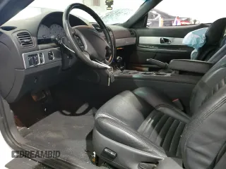 2002 Ford Thunderbird Hardtop Premium with VIN 1FAHP60A32Y125580, listed as a Copart auction lot 77493514 with 74,619 mi miles and Salvage Title. Bid and sale history available at DreamBid. Image 7.