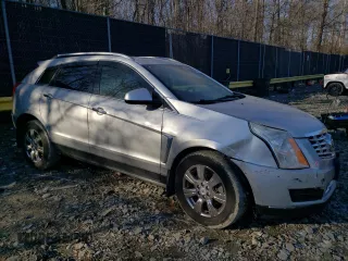 2014 Cadillac SRX Luxury Collection z VIN 3GYFNEE34ES641335, wystawiony jako Copart lot #47519325 z przebiegiem 124 407 mil mil oraz Szkoda całkowita • Salvage title. Historia ofert i sprzedaży dostępna na DreamBid. Obrazek 4.