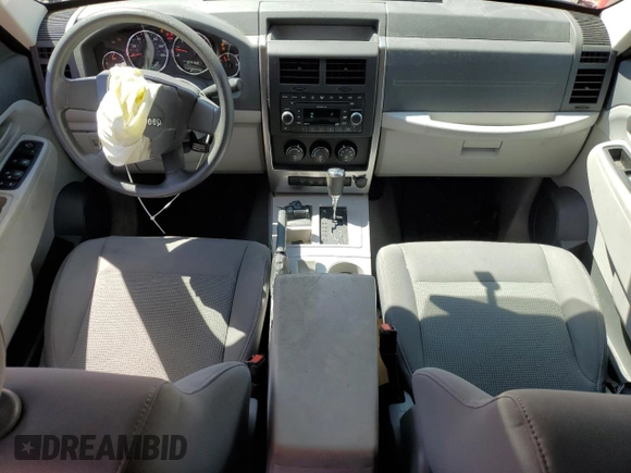 2008 Jeep Liberty Sport z VIN 1J8GN28K68W143375, wystawiony jako Copart lot #56186215 z przebiegiem 64 472 mil mil oraz Szkoda całkowita • Salvage title. Historia ofert i sprzedaży dostępna na DreamBid. Obrazek 8.