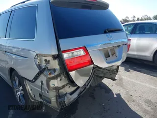 2005 Honda Odyssey TOURING with VIN 5FNRL38865B128519, listed as a IAAI auction lot 41830182 with 171,010 mi miles. Bid and sale history available at carsss.com. Image 6.
