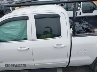 2015 GMC Sierra 1500 SLE z VIN 1GTR1UEH0FZ358519, wystawiony jako IAAI lot #42212768 z przebiegiem 144 324 mil mil oraz . Historia ofert i sprzedaży dostępna na DreamBid. Obrazek 14.