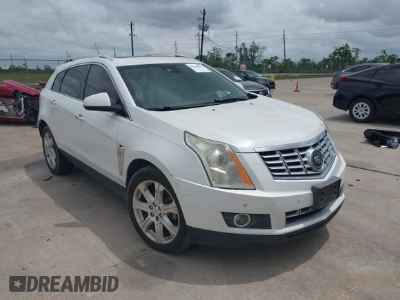2014 Cadillac SRX Premium Collection with VIN 3GYFNDE31ES615995, listed as a IAAI auction lot 42148943 with 232,752 mi miles and . Bid and sale history available at DreamBid. Image 1.