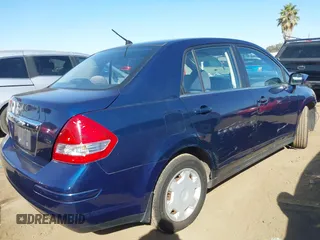 2009 Nissan Versa 1.8 S with VIN 3N1BC11E29L360857, listed as a IAAI auction lot 40629379 with 114,499 mi miles. Bid and sale history available at carsss.com. Image 4.