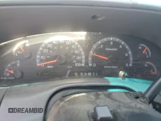 1999 Ford F-150 with VIN 1FTZX1727XKA70271, listed as a Copart auction lot 58016095 with 219,093 mi miles and Salvage title. Bid and sale history available at DreamBid. Image 9.