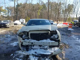 2009 Chrysler 300 Touring with VIN 2C3KA53V99H621745, listed as a IAAI auction lot 41604655 with 115,004 mi miles. Bid and sale history available at carsss.com. Image 6.