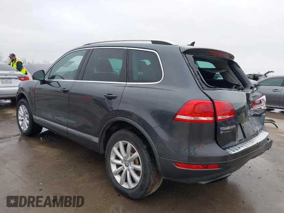2012 Volkswagen Touareg Sport with VIN WVGEF9BP9CD008545, listed as a IAAI auction lot 41492653 with 138,424 mi miles and . Bid and sale history available at DreamBid. Image 3.