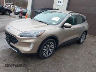 2021 Ford Escape Titanium Hybrid with VIN 1FMCU9DZXMUA66161, listed as a IAAI auction lot 41208651 with 61,198 mi miles and . Bid and sale history available at DreamBid. Image 18.