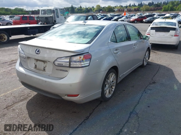 2010 Lexus HS 250h with VIN JTHBB1BA7A2007191, listed as a IAAI auction lot 42068847 with 213,323 mi miles. Bid and sale history available at carsss.com. Image 4.