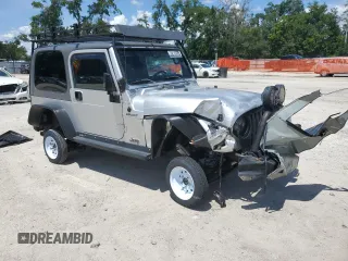 2005 Jeep Wrangler Sport z VIN 1J4FA49S75P324462, wystawiony jako Copart lot #59818995 z przebiegiem 183 558 mil mil oraz Nie do naprawy • Non repairable. Historia ofert i sprzedaży dostępna na DreamBid. Obrazek 4.