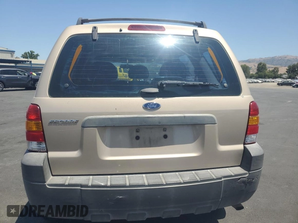 2007 Ford Escape XLS с VIN 1FMYU02Z17KA20500, выставлен на аукционе Copart как лот 59016055 с пробегом 215 936 миль миль и Списание • Salvage title. История ставок и продаж доступна на DreamBid. Изображение 6.
