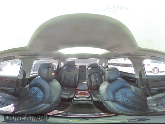 2017 Audi A8 with VIN WAU44AFD0HN006074, listed as a Copart auction lot 52421465 with 144,744 mi miles and Salvage title. Bid and sale history available at DreamBid. Image 14.