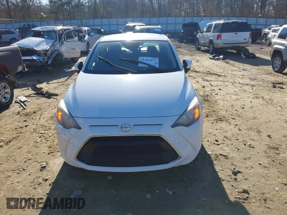 2016 Scion iA z VIN 3MYDLBZV6GY119076, wystawiony jako IAAI lot #41282871 z przebiegiem Nie podano mil oraz . Historia ofert i sprzedaży dostępna na DreamBid. Obrazek 11.