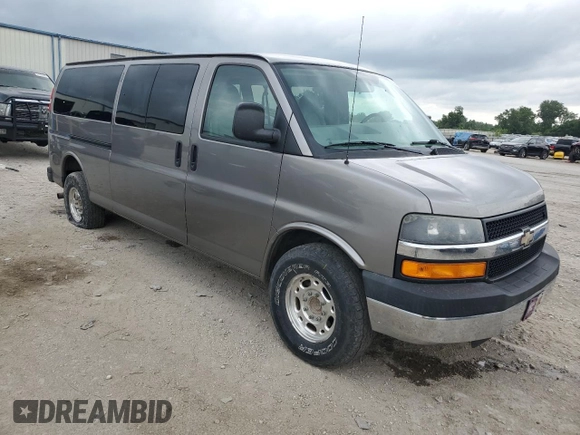 2007 Chevrolet Express Passenger with VIN 1GAHG39U771237121, listed as a Copart auction lot 60245775 with 187,005 mi miles and Salvage title. Bid and sale history available at DreamBid. Image 4.