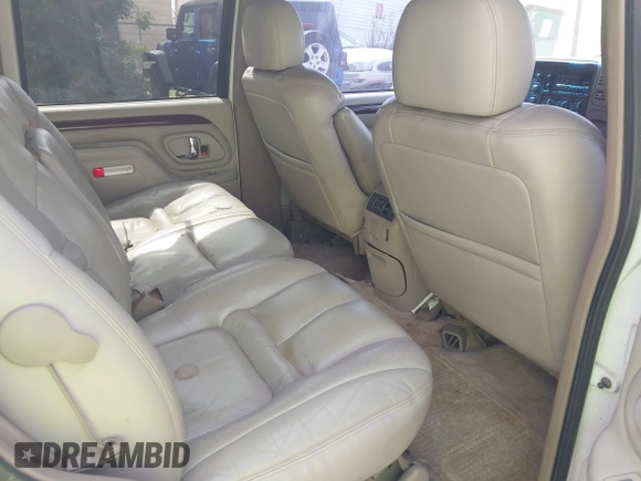 1999 Cadillac Escalade z VIN 1GYEK13R9XR400123, wystawiony jako IAAI lot #41837946 z przebiegiem 207 213 mil mil oraz . Historia ofert i sprzedaży dostępna na DreamBid. Obrazek 8.