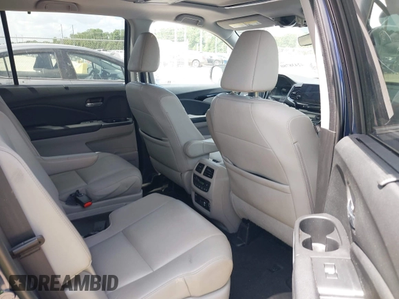 2022 Honda Pilot Touring 7-Passenger with VIN 5FNYF5H61NB019768, listed as a IAAI auction lot 42438780 with Not provided miles and . Bid and sale history available at DreamBid. Image 8.