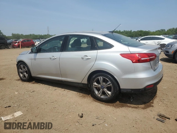 2017 Ford Focus SE with VIN 1FADP3FE7HL290271, listed as a Copart auction lot 60665615 with 130,409 mi miles and Salvage title. Bid and sale history available at DreamBid. Image 2.