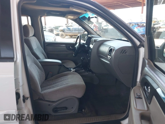 2004 GMC Envoy SLT with VIN 1GKDS13S442217242, listed as a IAAI auction lot 42573887 with 210,296 mi miles and . Bid and sale history available at DreamBid. Image 5.