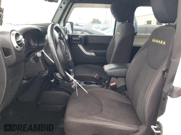 2013 Jeep Wrangler Sahara with VIN 1C4AJWBG8DL691619, listed as a Copart auction lot 56194275 with 103,299 mi miles and Salvage title. Bid and sale history available at DreamBid. Image 7.