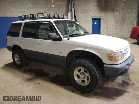 2000 Ford Explorer XLT с VIN 1FMZU83PXYZA51396, выставлен на аукционе Copart как лот 62365505 с пробегом 230 018 миль миль и Списание • Salvage title. История ставок и продаж доступна на DreamBid. Изображение 4.
