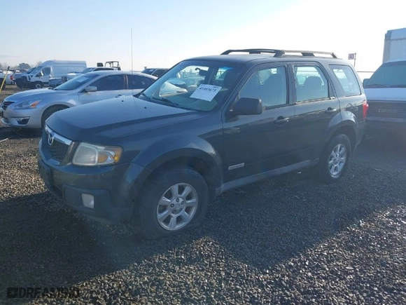 2008 Mazda Tribute Touring with VIN 4F2CZ96168KM05738, listed as a IAAI auction lot 41403675 with 217,593 mi miles. Bid and sale history available at carsss.com. Image 2.