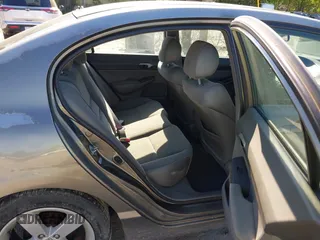 2006 Honda Civic LX z VIN 2HGFA16556H526744, wystawiony jako IAAI lot #42360805 z przebiegiem 236 970 mil mil oraz . Historia ofert i sprzedaży dostępna na DreamBid. Obrazek 8.