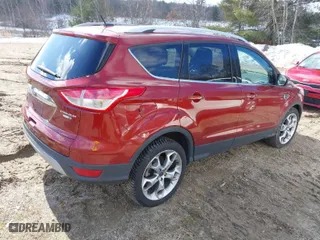 2016 Ford Escape Titanium with VIN 1FMCU9J9XGUC71696, listed as a IAAI auction lot 41651168 with 108,856 mi miles. Bid and sale history available at carsss.com. Image 4.