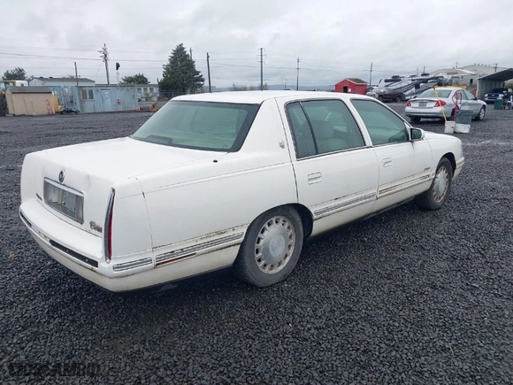 1999 Cadillac DeVille with VIN 1G6KD54Y5XU768072, listed as a IAAI auction lot 41777526 with NaN miles. Bid and sale history available at carsss.com. Image 4.