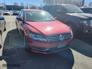 2015 Volkswagen Passat 1.8T S with VIN 1VWAT7A38FC052929, listed as a IAAI auction lot 41736981 with 87,464 mi miles. Bid and sale history available at carsss.com. Image 1.