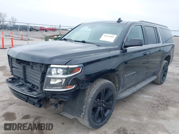 2019 Chevrolet Suburban LT with VIN 1GNSKHKC7KR192984, listed as a IAAI auction lot 41833683 with 176,406 mi miles and . Bid and sale history available at DreamBid. Image 2.